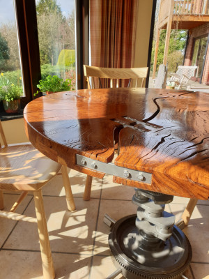 Pub table using engine crankcase as pillar